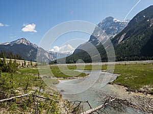 Snow capped mountains and river valley