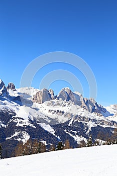 Snow-capped mountains in Trentino Alto Adige. Mountains in winter. Winter landscape in the Alps Mountains, Moena, Val di Fassa