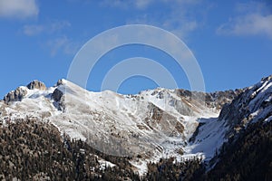 Snow-capped mountains in Trentino Alto Adige. Mountains in winter. Winter landscape in the Alps Mountains, Moena, Val di Fassa