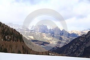 Snow-capped mountains in Trentino Alto Adige. Mountains in winter. Winter landscape in the Alps Mountains, Moena, Val di Fassa