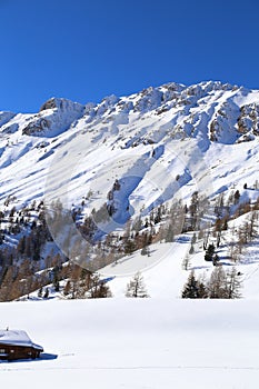 Snow-capped mountains in Trentino Alto Adige. Mountains in winter. Winter landscape in the Alps Mountains, Moena, Val di Fassa