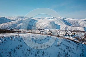 Snow-capped mountains under the bright sun