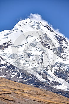 The snow capped peak of Mt Ausangate. Cordillera Vilcanota, Cusco, Peru