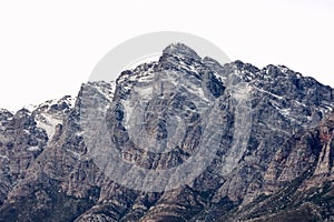 Snow-capped peaks of Breede Valley's distant mountains on a chilly day in Worcester, South Africa