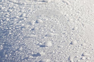 Snow on car windshield covered with fresh Christmas snow