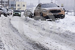 Snow city road rut, cleaning of snowy roads, dangerous driving