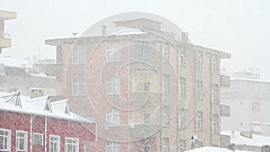 Snow in city. Tilt Video