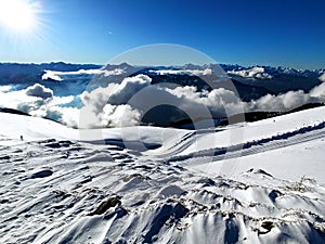 Snow and clouds in Alps mountains