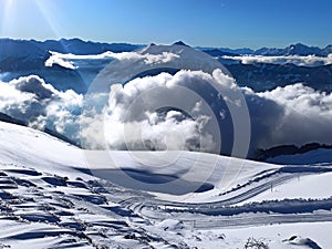 Snow and clouds in Alps mountains