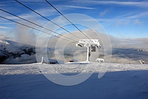 Snow clouds and lift. photo