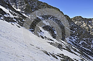 Snow covered alpine landscape on Colorado 14er Little Bear Peak photo