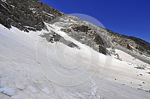 Snow covered alpine landscape on Colorado 14er Little Bear Peak photo