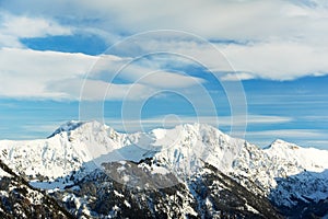 Snow covered beautiful alpine mountain peaks