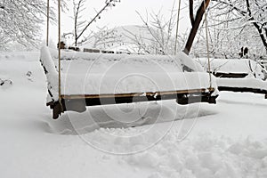 snow covered bench. It\'s time for doom, it\'s too middling
