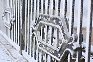 Snow-covered bridge fence