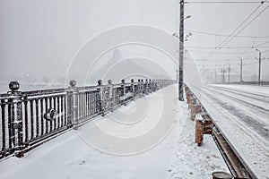 Snow covered bridge during heavy snow storm