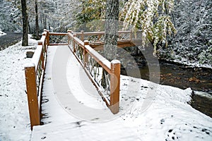 Snow Covered Bridge Over Mountain Creek