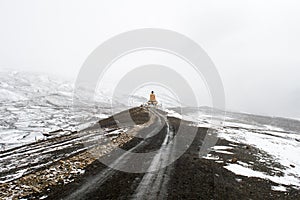 Snow Covered Buddha Statue in Langza Village, Spiti Valley, Himachal Pradesh