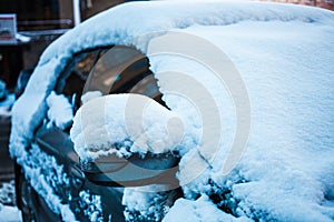 Snow-covered car.