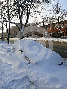 Snow covered car