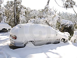 Snow covered car