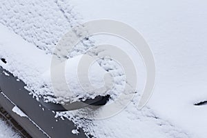 Snow covered car