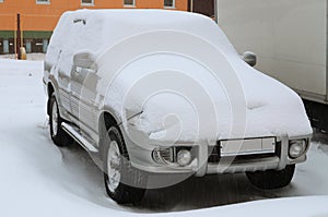 Snow covered car photo