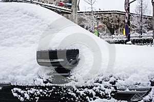 Snow-covered car at Zhonghuamen Castle