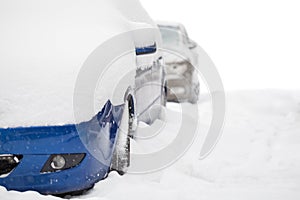 Snow covered cars with copy space photo