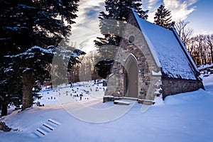 Snow-covered cemetery at the Grotto of Lordes in Emmitsburg, Mar photo