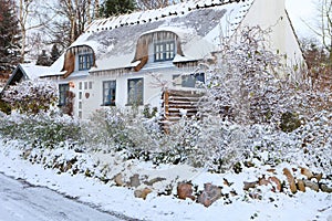 Snow covered cottage in Denmark