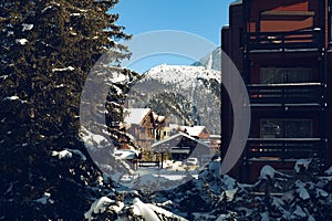 Snow-covered cottages at the French Alps, Les3Vallees. Mountains ski resort