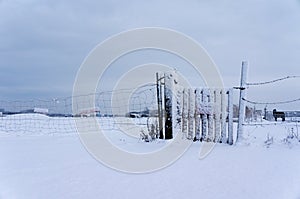 Snow covered fence