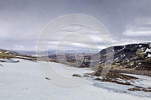 The snow covered FossÃ¡rdalur valley in Iceland