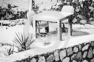 Snow Covered Garden Table And Seats