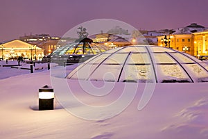 Snow covered glass cupola on Manege square, Moscow