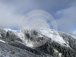 Snow covered Hehuanshan mountain with clouds stock photo