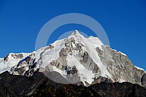 Snow covered high mountain