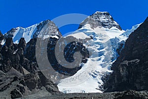 Snow covered high mountain in Andes
