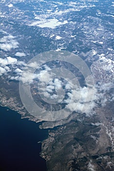 Snow-covered hilly terrain and sea coast, aerial photograph. Novi-Vinodolski, Povile, Klenovica, Croatia