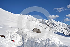 Snow-covered Kedarnath temple route in Himalaya.