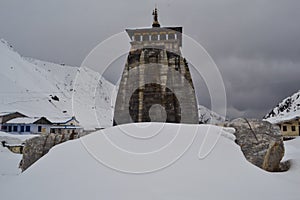 Snow covered Kedarnath temple and valley in Upper Himalaya India.