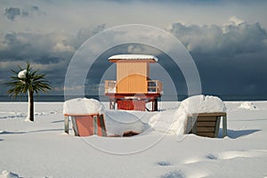 Snow covered lifeguard tower