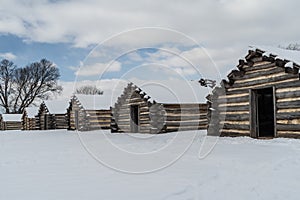 Snow Covered Log Cabins at Valley Forge Historical Park