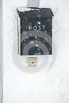 Snow Covered Mailbox. Winter snow caps a mailbox. Snow chaos and catastrophe alert in Bavaria south Germany Winter 2019