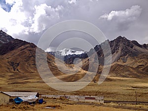 Snow covered mountain at Abra La Raya Pass in the Peruvian Andes