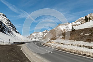 Snow covered mountain panorama on the Julier pass in Switzerland photo
