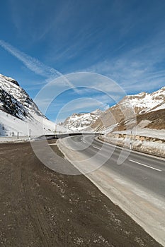 Snow covered mountain panorama on the Julier pass in Switzerland photo