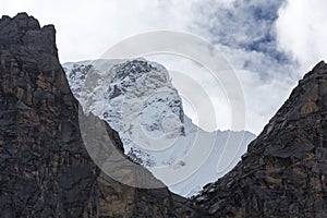 Snow covered mountain peak and blue sky, Cordillera Blanca, Peru