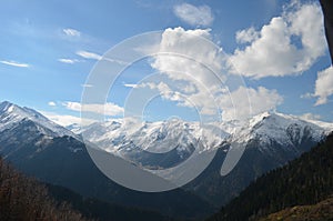 Snow covered mountain range photo